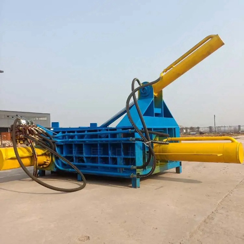 Waste metal scrap baler